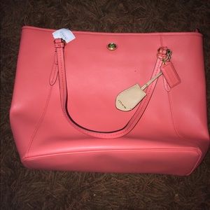 New with tags Coach leather zip tote